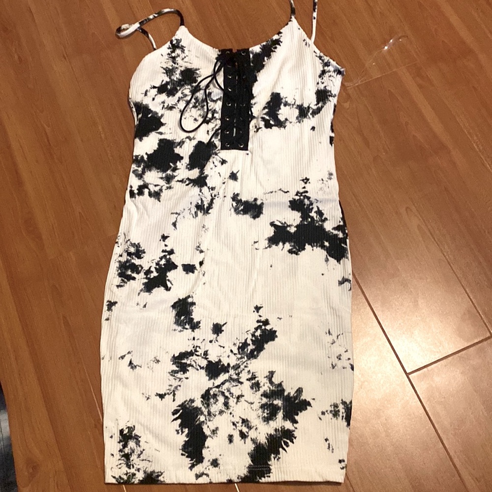 ATTIRANCE: white with black spot tie front dress